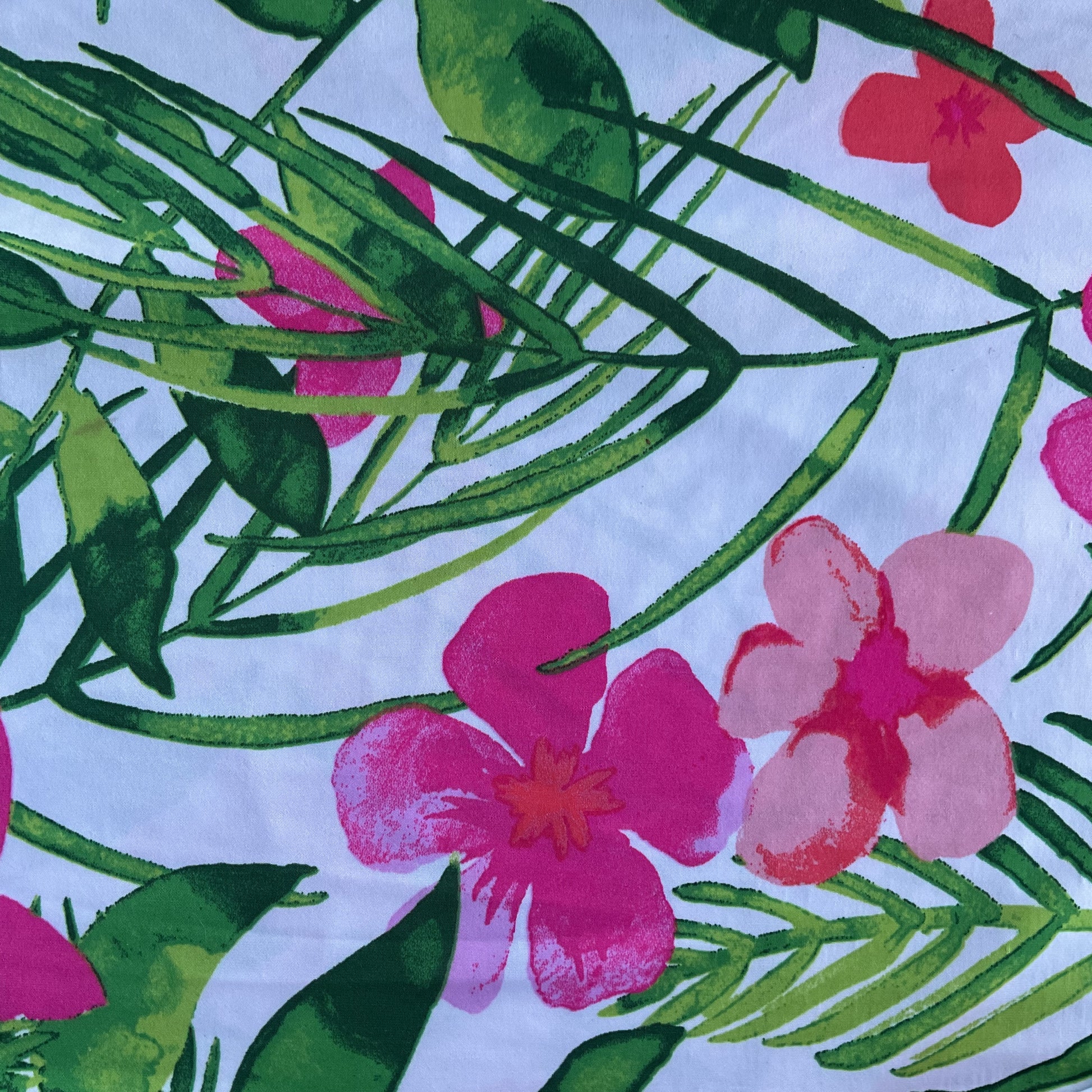 pink green and white floral fabric