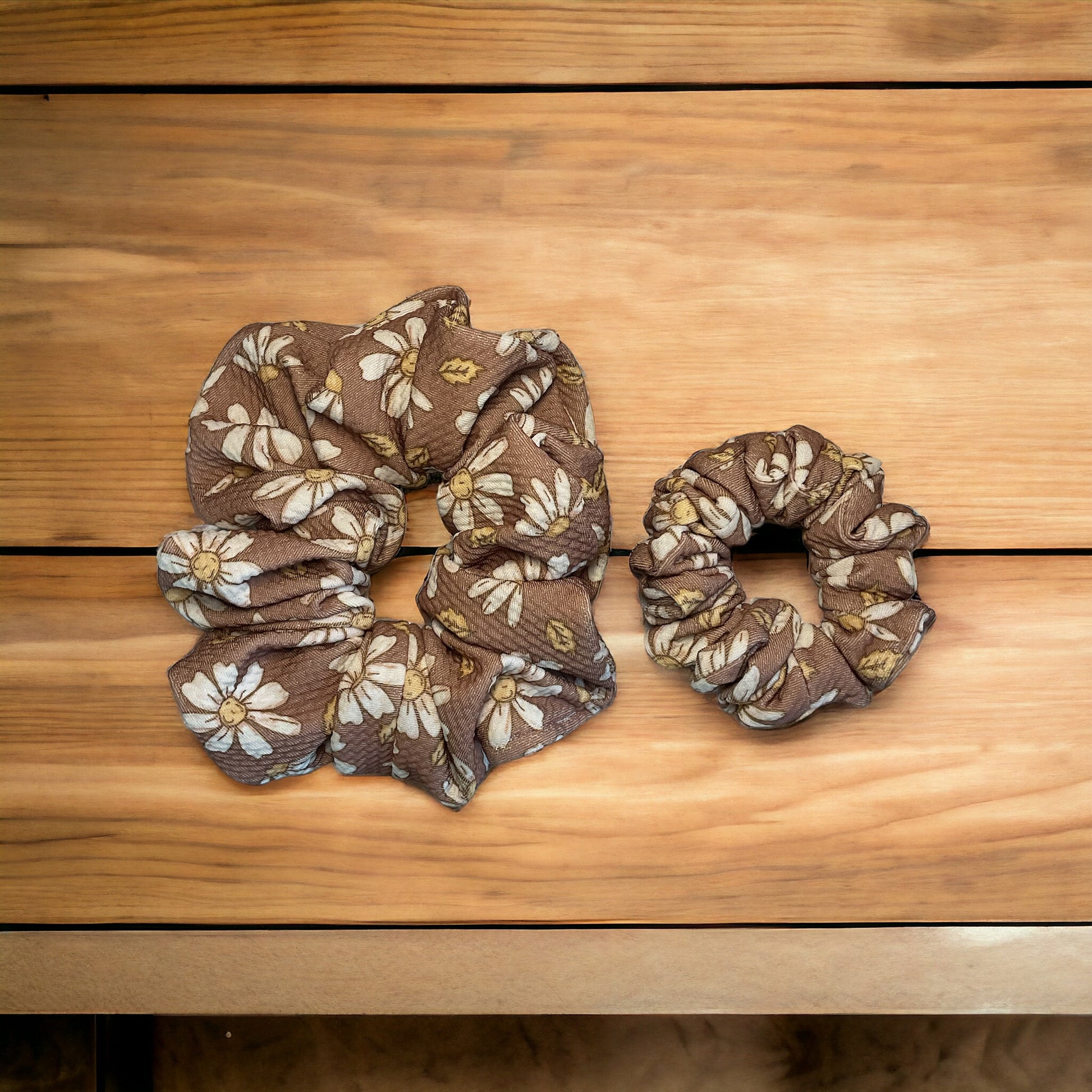 two brown and daisy scrunchies