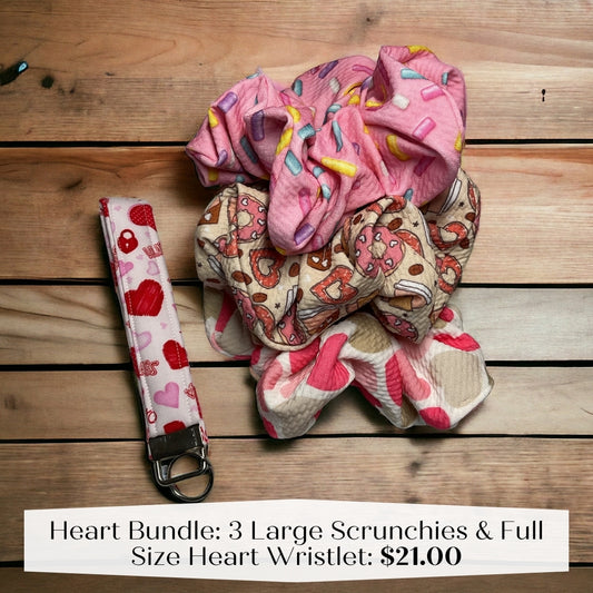 bundle of three pink scrunchies and heart keychain