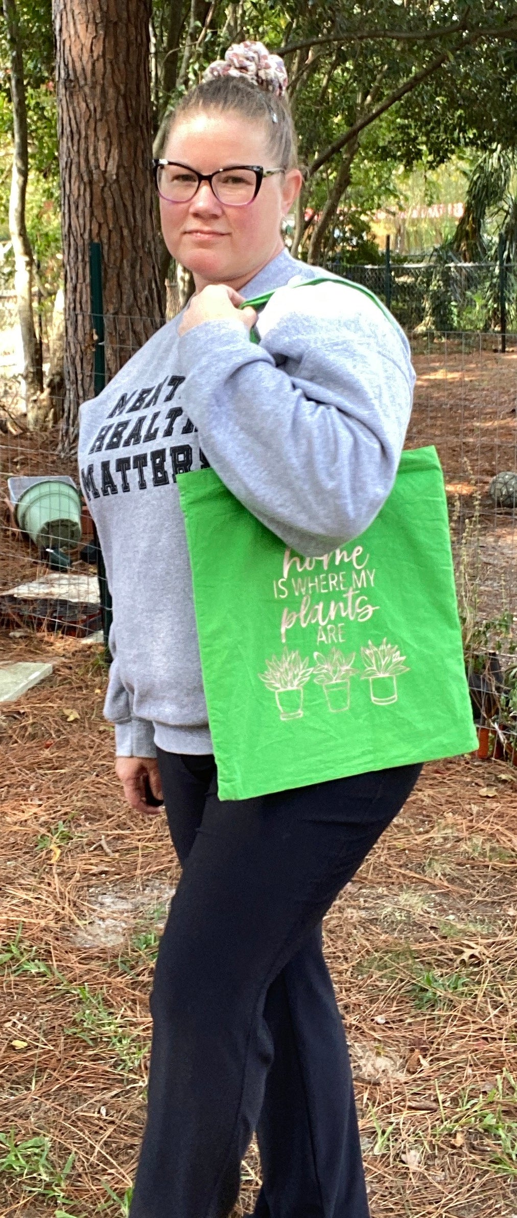 Woman holding tote bag