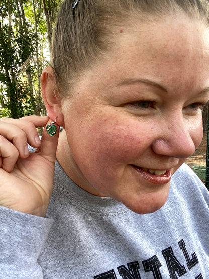 woman wearing thai constellation hand painted earrings