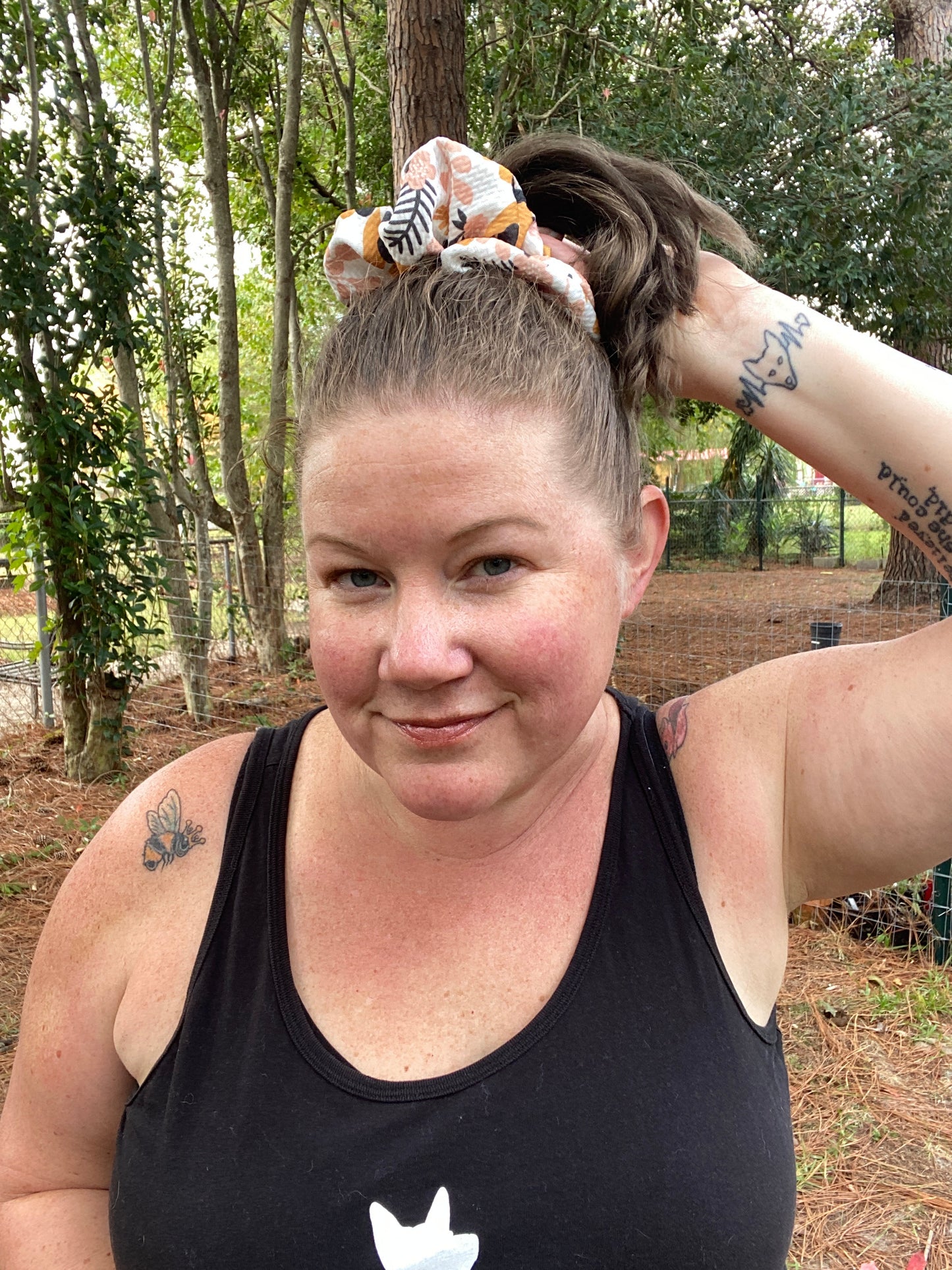 Woman wearing flower scrunchie