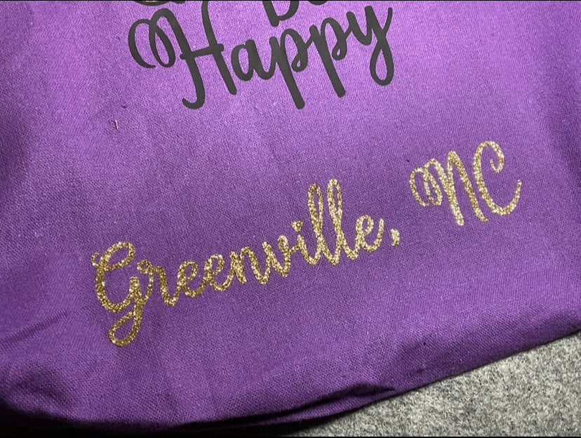 Greenville NC in glitter purple background