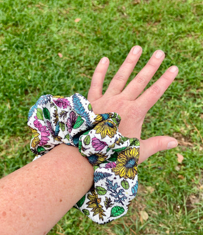 colorful scrunchies on wrist