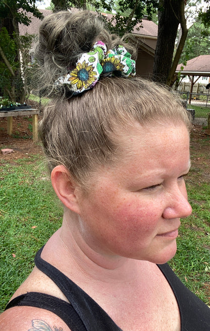 woman wearing colorful scrunchie