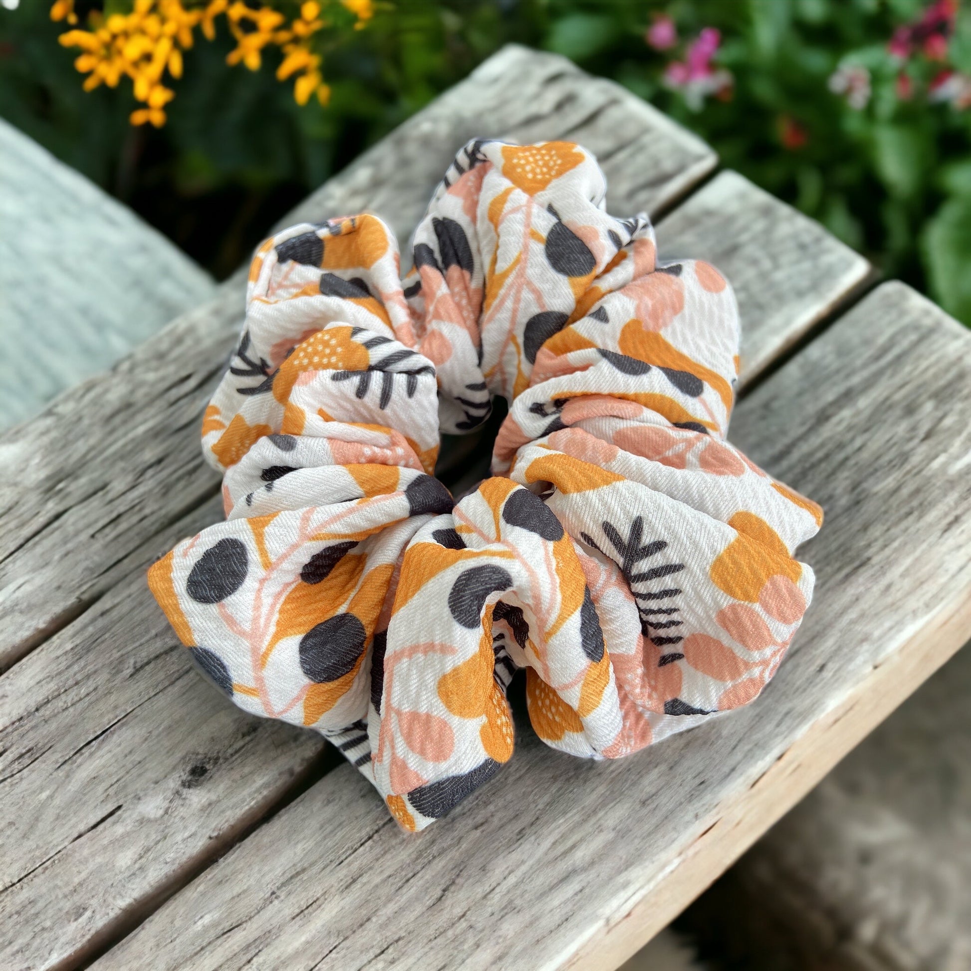 flower scrunchie on a bench