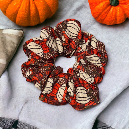 brown and orange pumpkin scrunchie