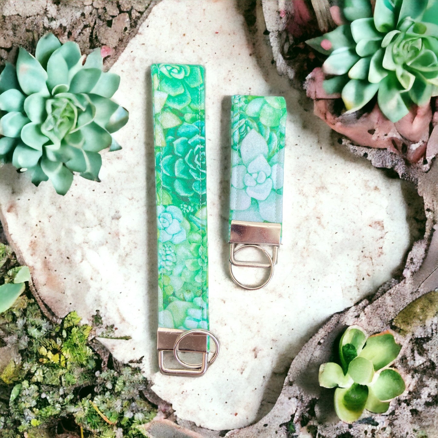 two water color green succulent keychains