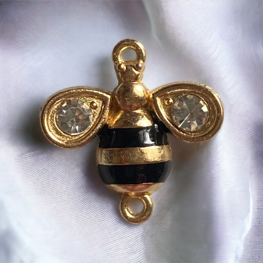 close up of honeybee charm