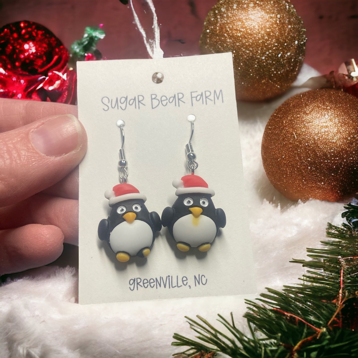 Pair of penguin earrings