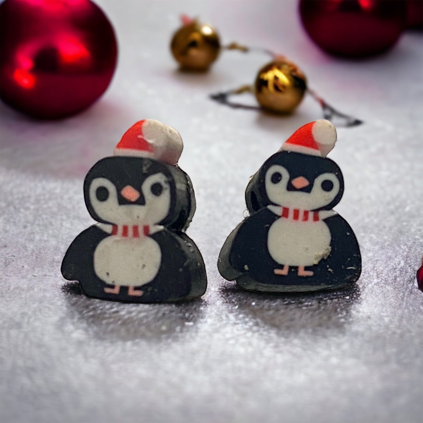 Pair of penguin earrings