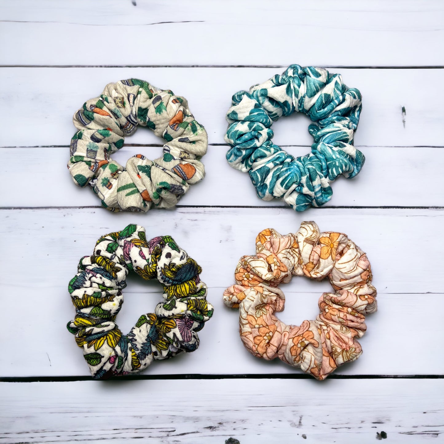 four plant themed scrunchies