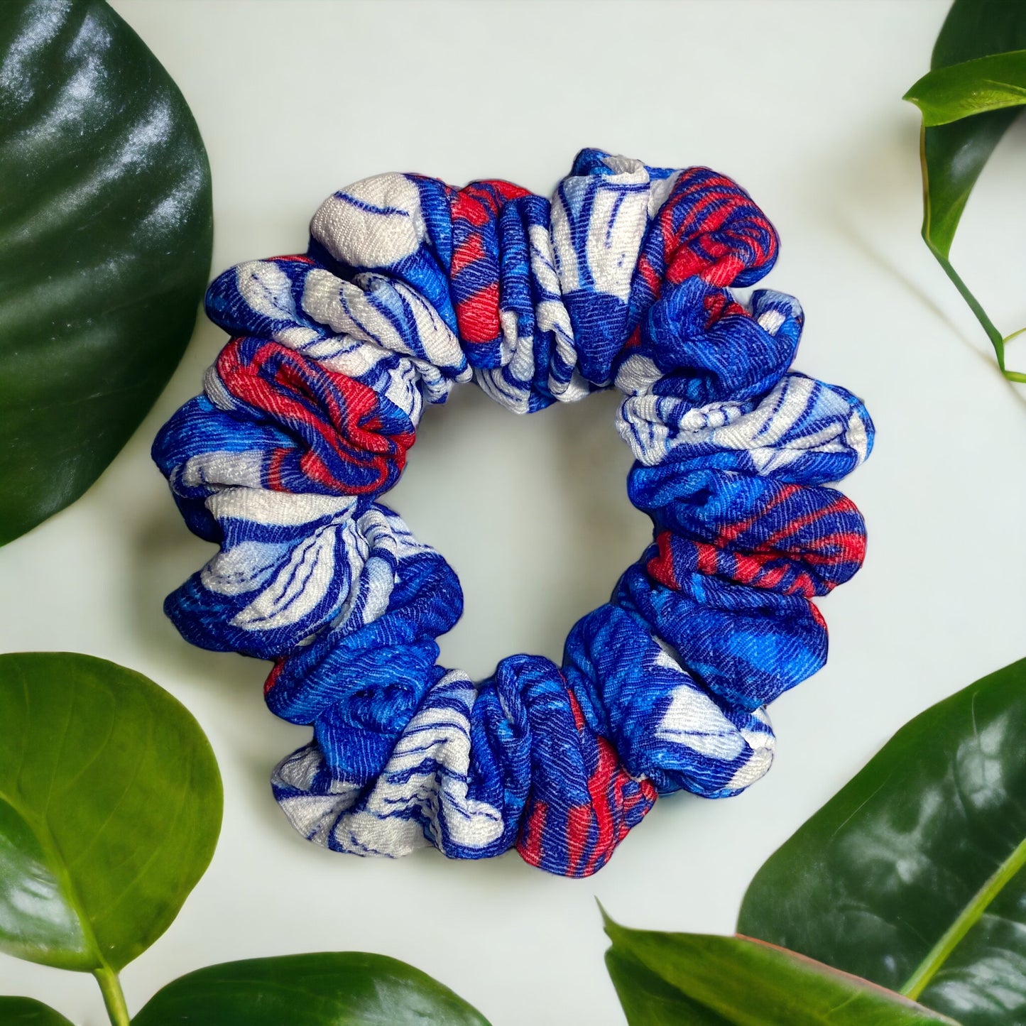 red, white, and blue floral scrunchie