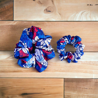 red, white, and blue floral scrunchies on a wooden background