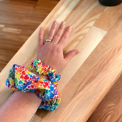 rainbow hearts scrunchie on arm