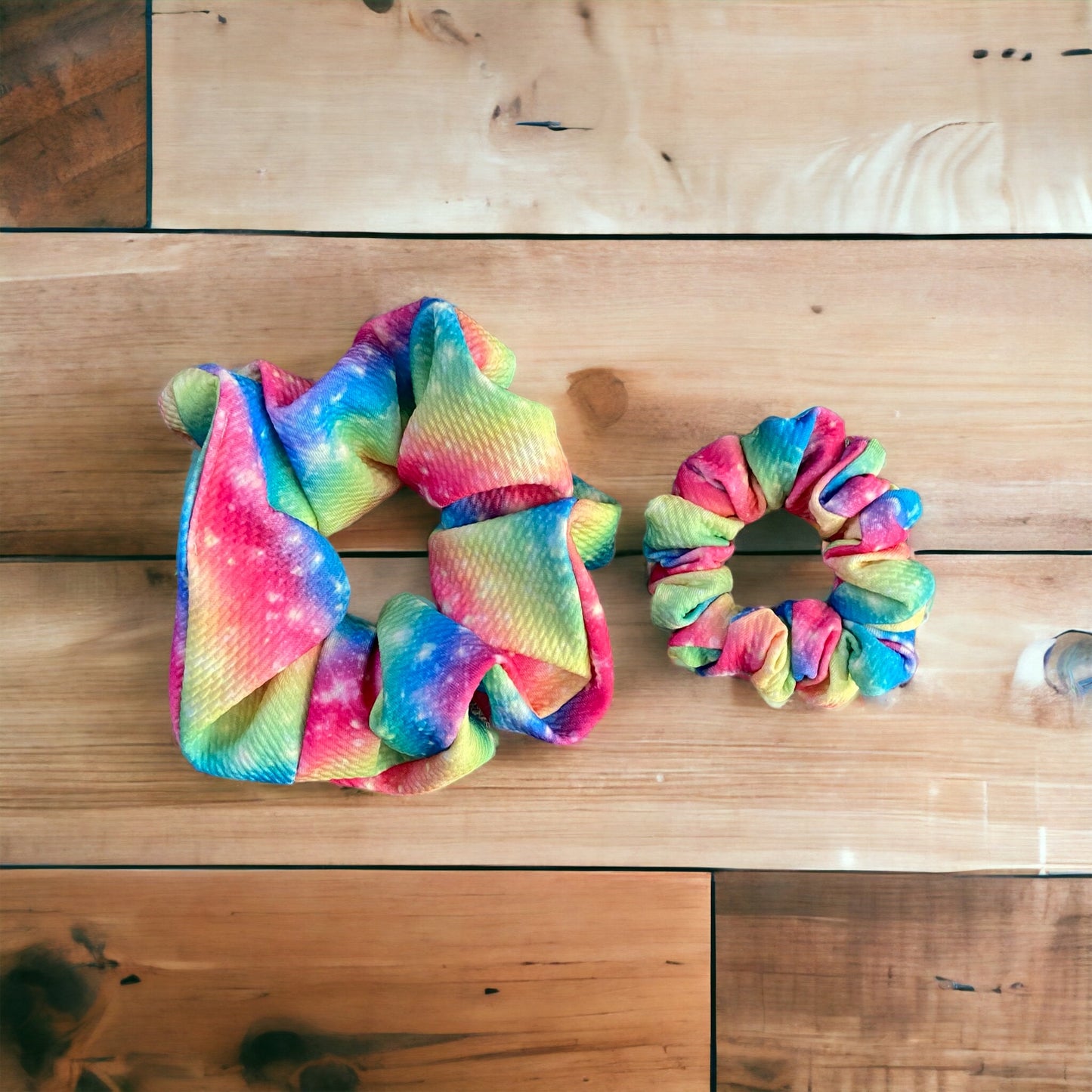 two rainbow sparkle scrunchies