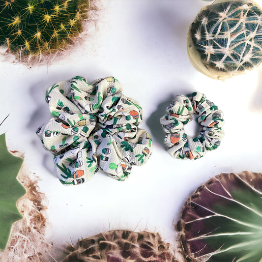 two cactus scrunchies with cactus