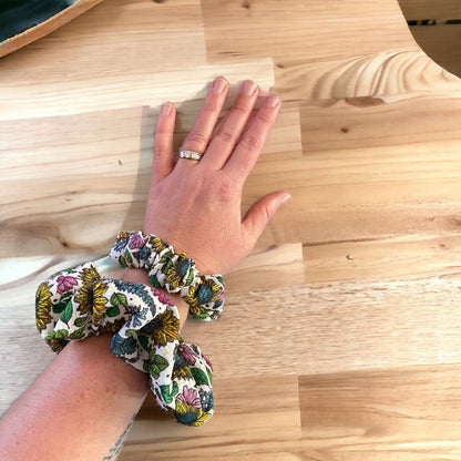 colorful scrunchies on wrist