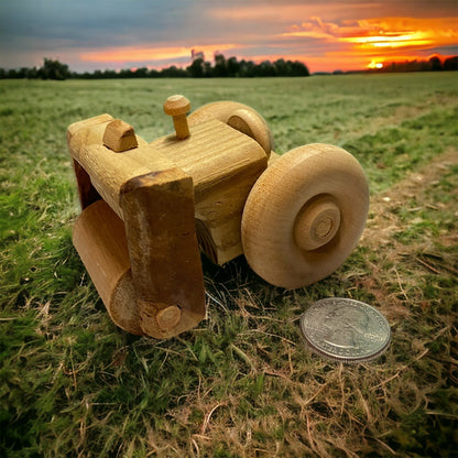 wooden steamroller on grass