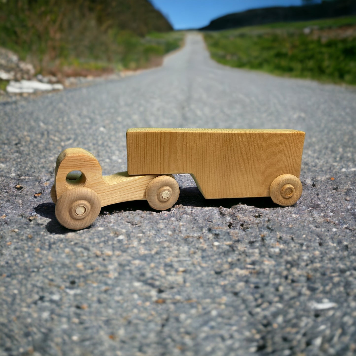 Wooden truck and trailer on a road