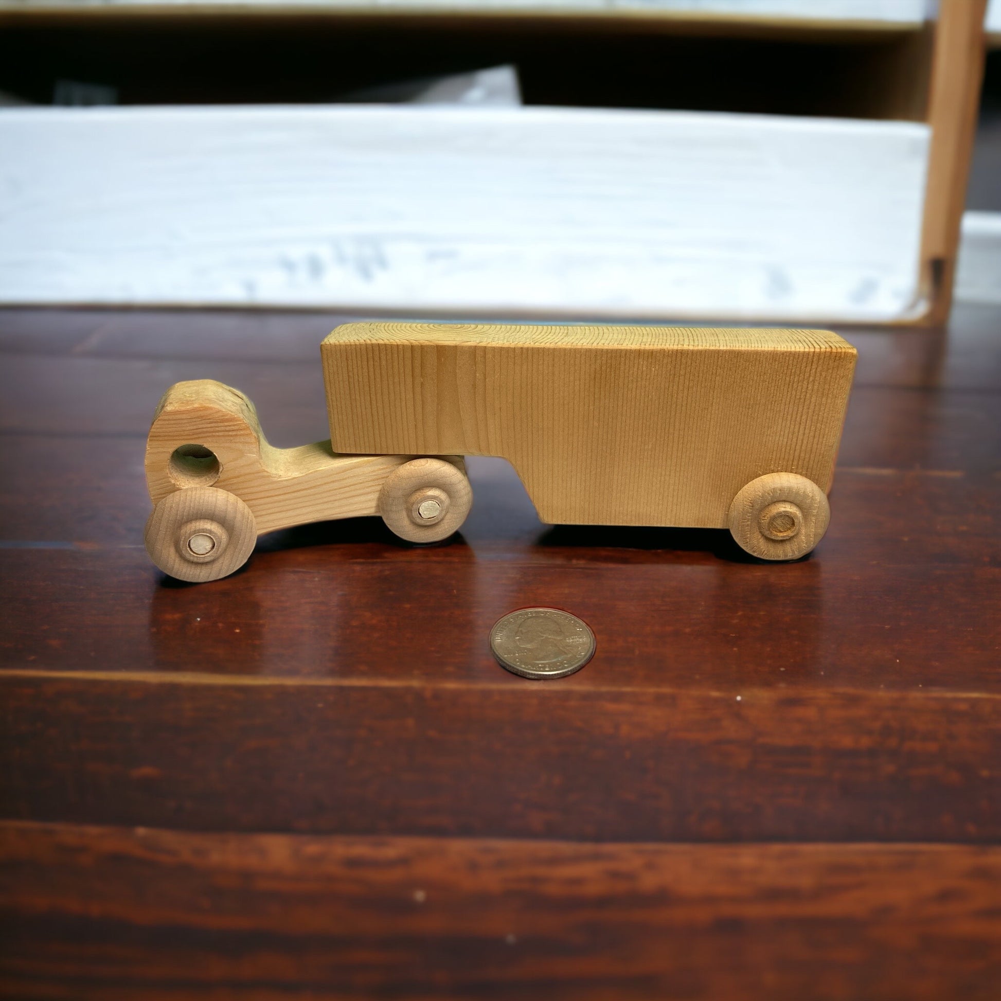 Wooden truck and trailer on a table