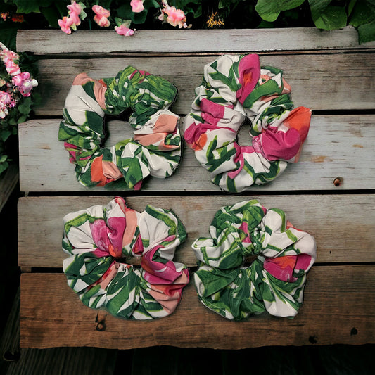 pink green and white floral scrunchie on wooden table