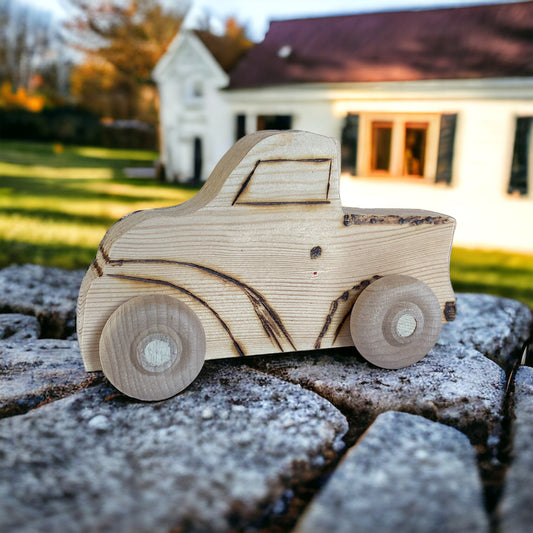 wooden truck wood burn on rocks