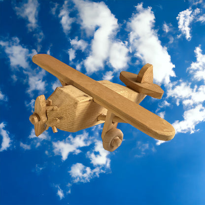 Wooden Airplane with sky background