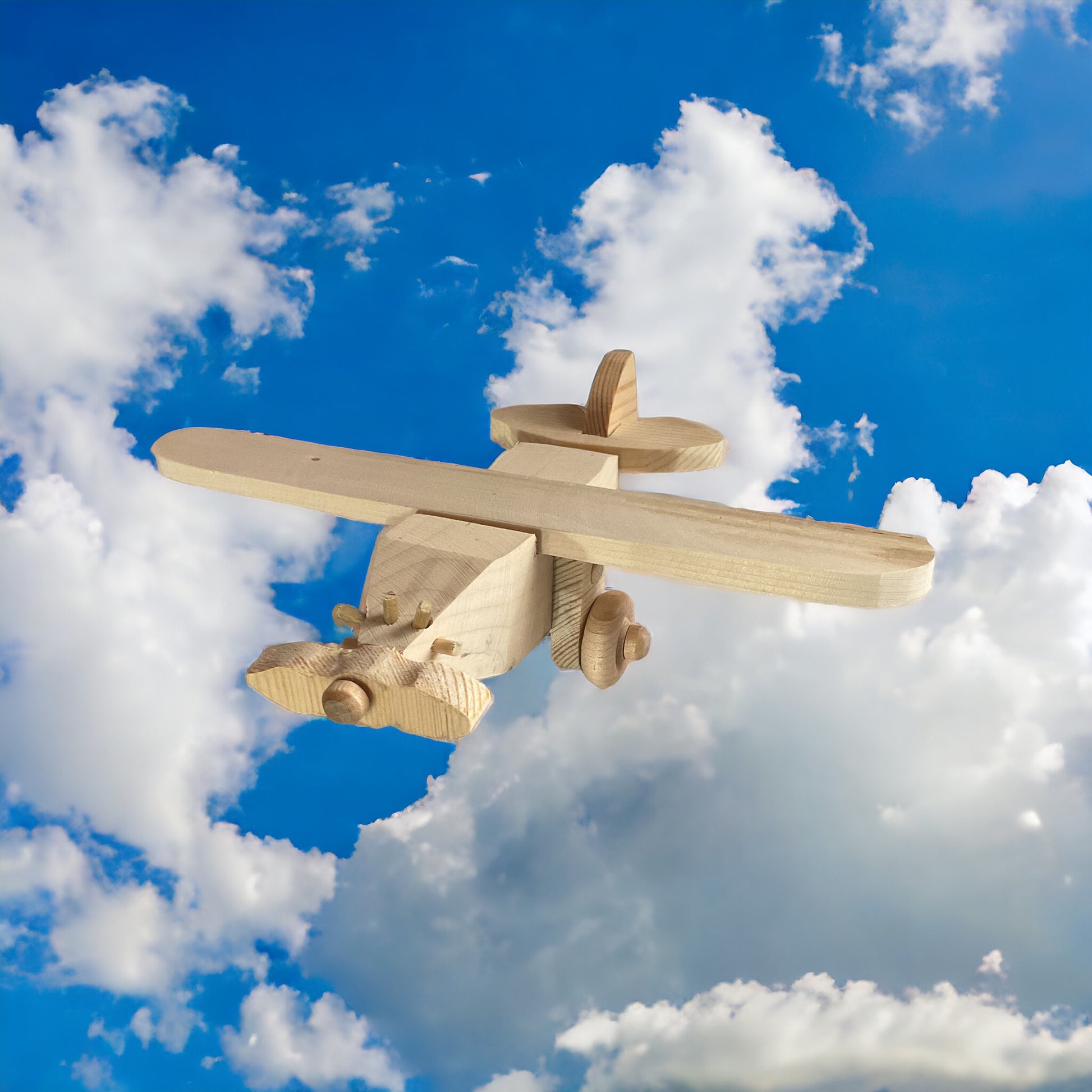 Wooden Airplane with cloudy sky background