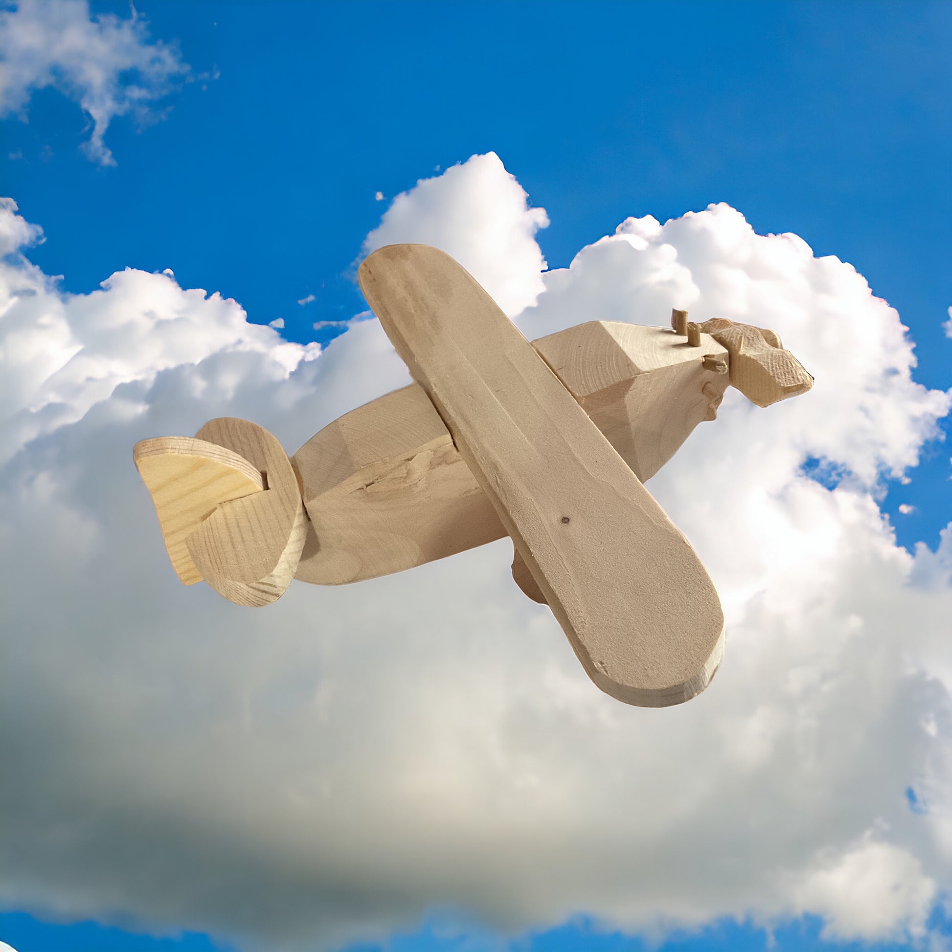 Wooden Airplane with clouds in the background