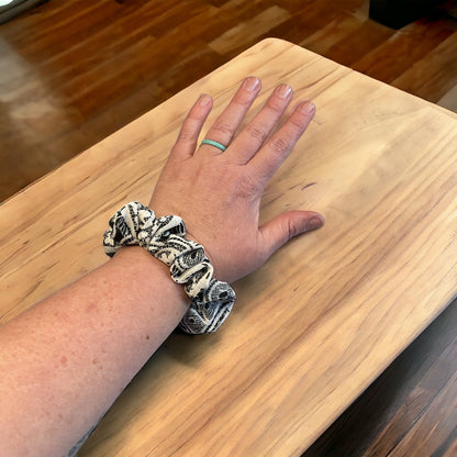 black and white lace scrunchie on wrist