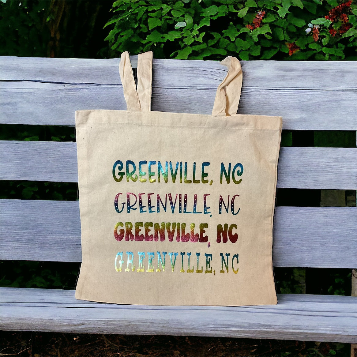 Greenville NC tote bag on a bench