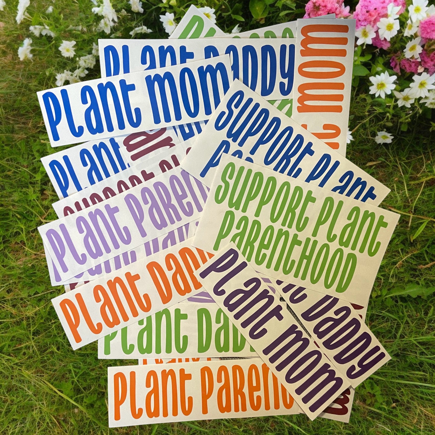 stack of stickers plant mom, plant daddy, support plant parenthood