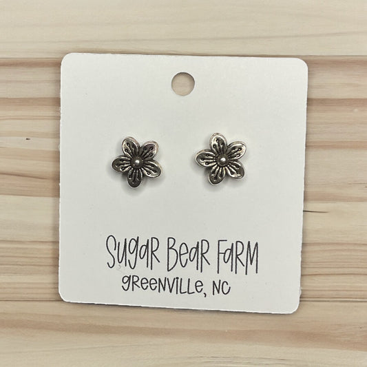 silver colored flower stud earrings