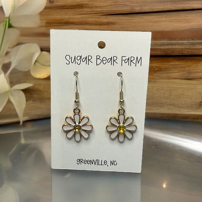 Pair of metal daisy earrings