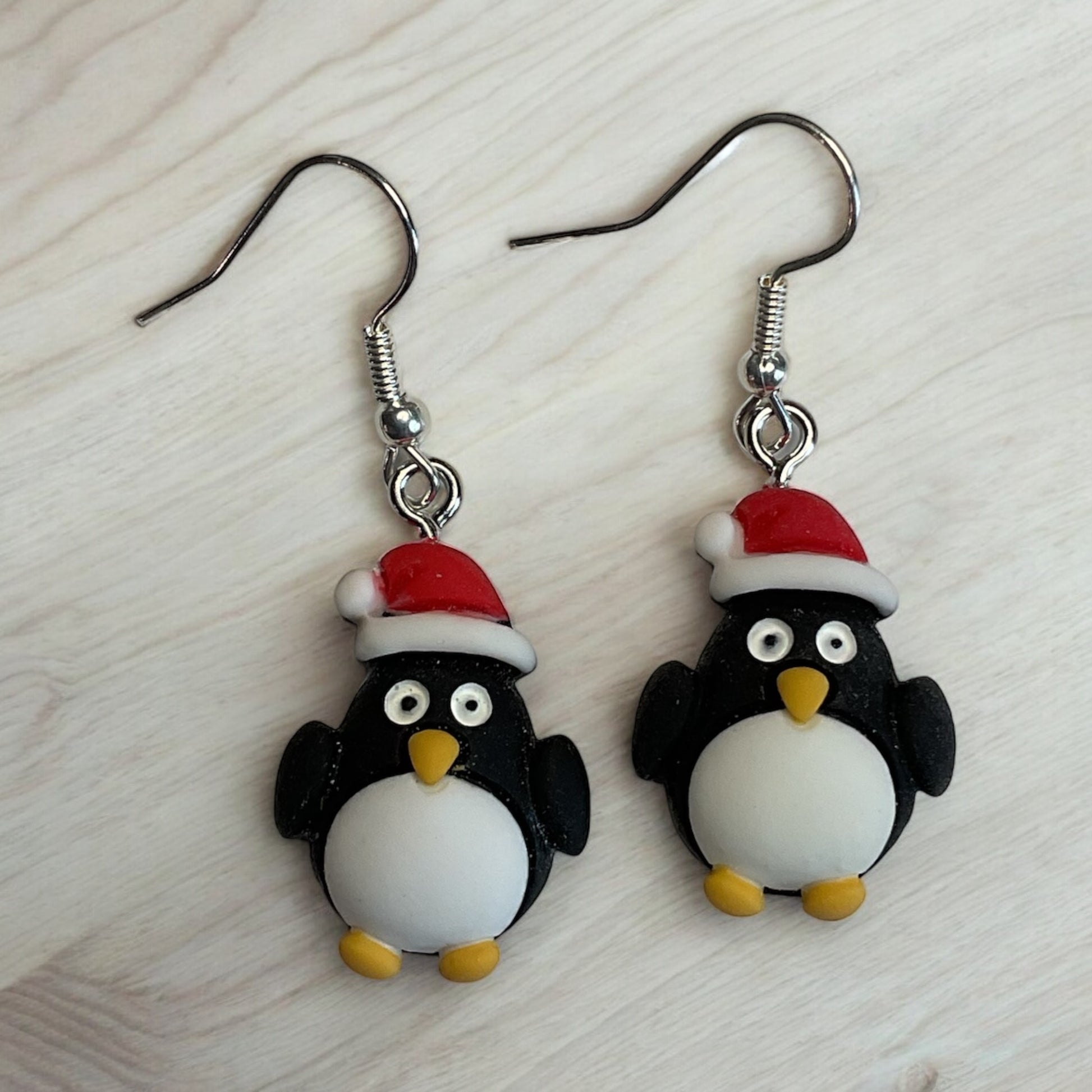 Pair of penguin earrings