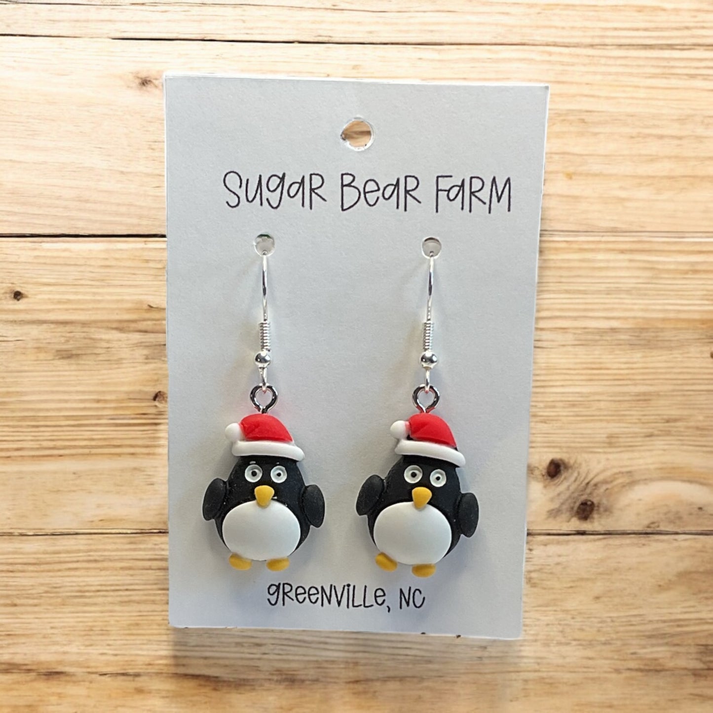 Pair of penguin earrings