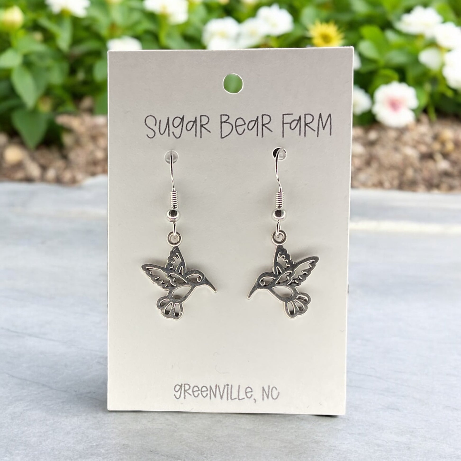 silver colored humming bird earrings