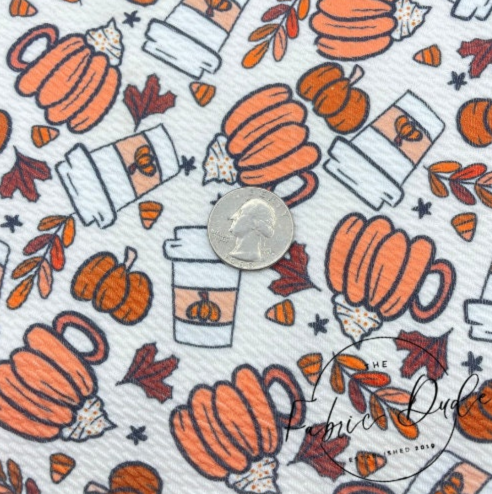 white and orange pumpkin fabric