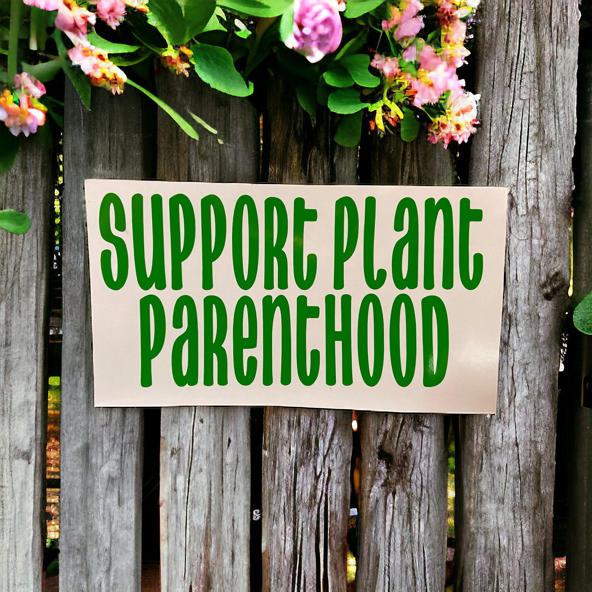 Green support plant parenthood decal on a wooden bench