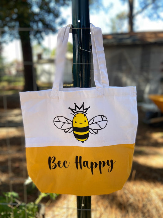 White and Yellow Honeybee wearing a crown tote bag